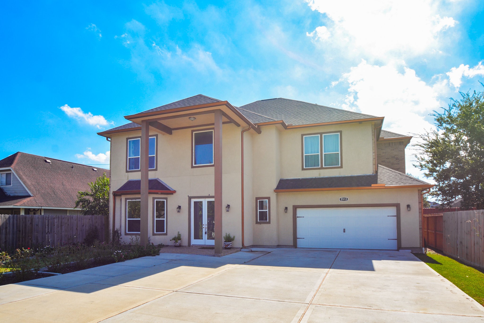 5513 Lotus Street Houston, TX 77085 - Photo 5 of 50 a front view of a house with a yard