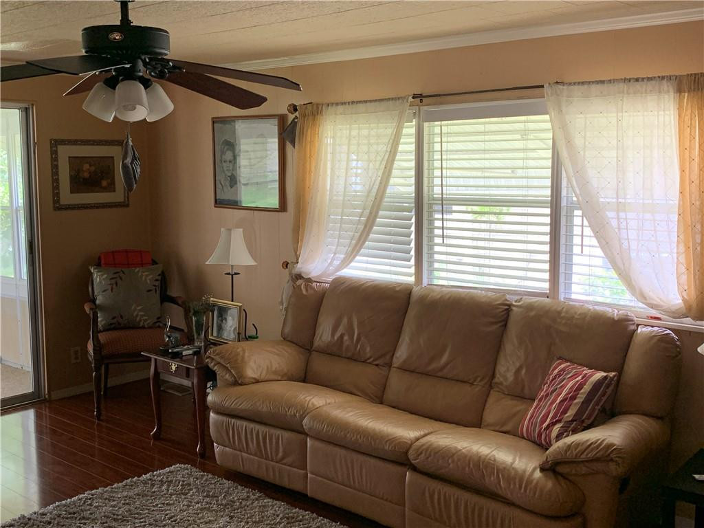8257 East Club Road Boca Raton, FL 33433 - Photo 15 of 28 a living room with furniture and a window