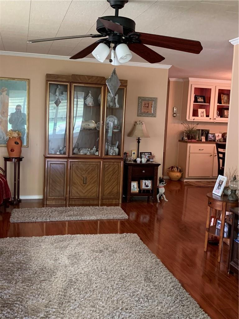 8257 East Club Road Boca Raton, FL 33433 - Photo 17 of 28 a view of a livingroom with furniture and hardwood floor