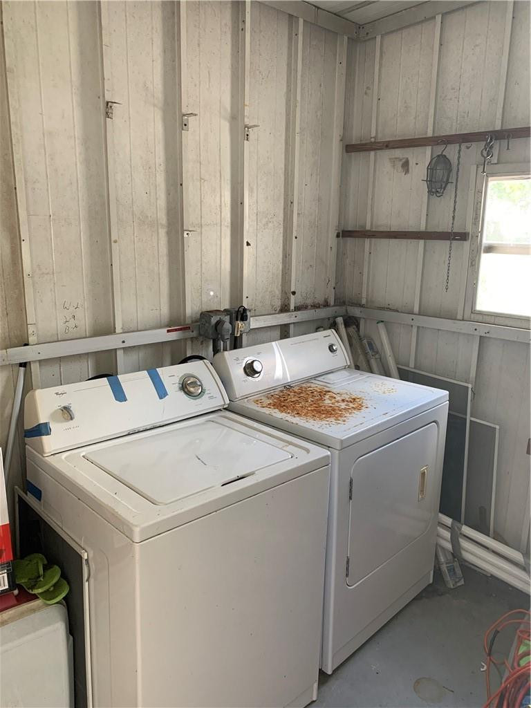 8257 East Club Road Boca Raton, FL 33433 - Photo 18 of 28 a utility room with dryer and washer