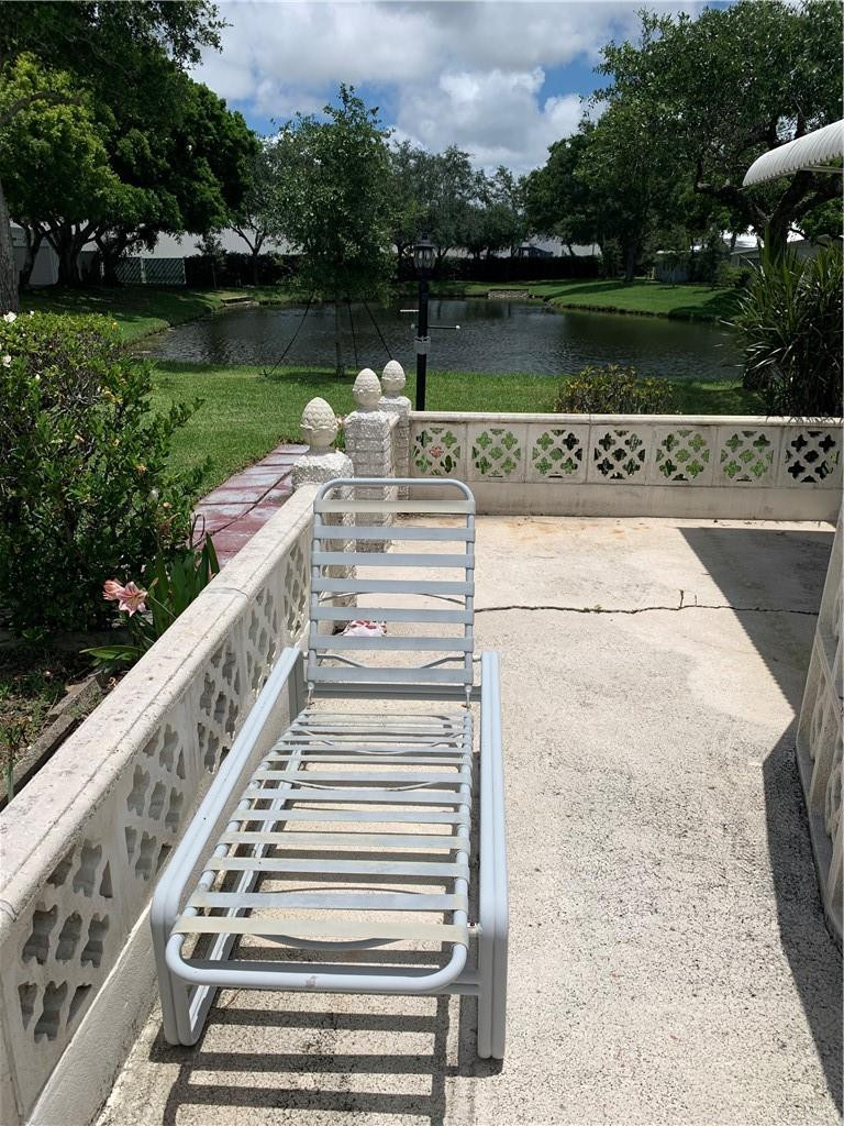 8257 East Club Road Boca Raton, FL 33433 - Photo 5 of 28 a view of a lake with a outdoor space