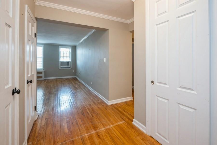 6665 Colonial Road, Unit 2F Brooklyn, NY 11220 - Photo 4 of 25 a view of a room with wooden floor and a bathroom