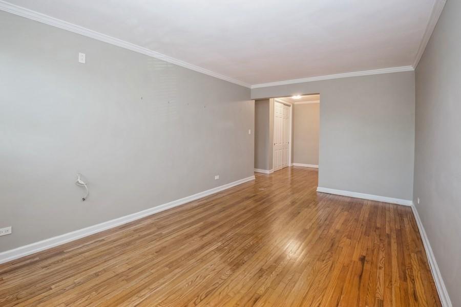 6665 Colonial Road, Unit 2F Brooklyn, NY 11220 - Photo 8 of 25 a view of an empty room with wooden floor and a window