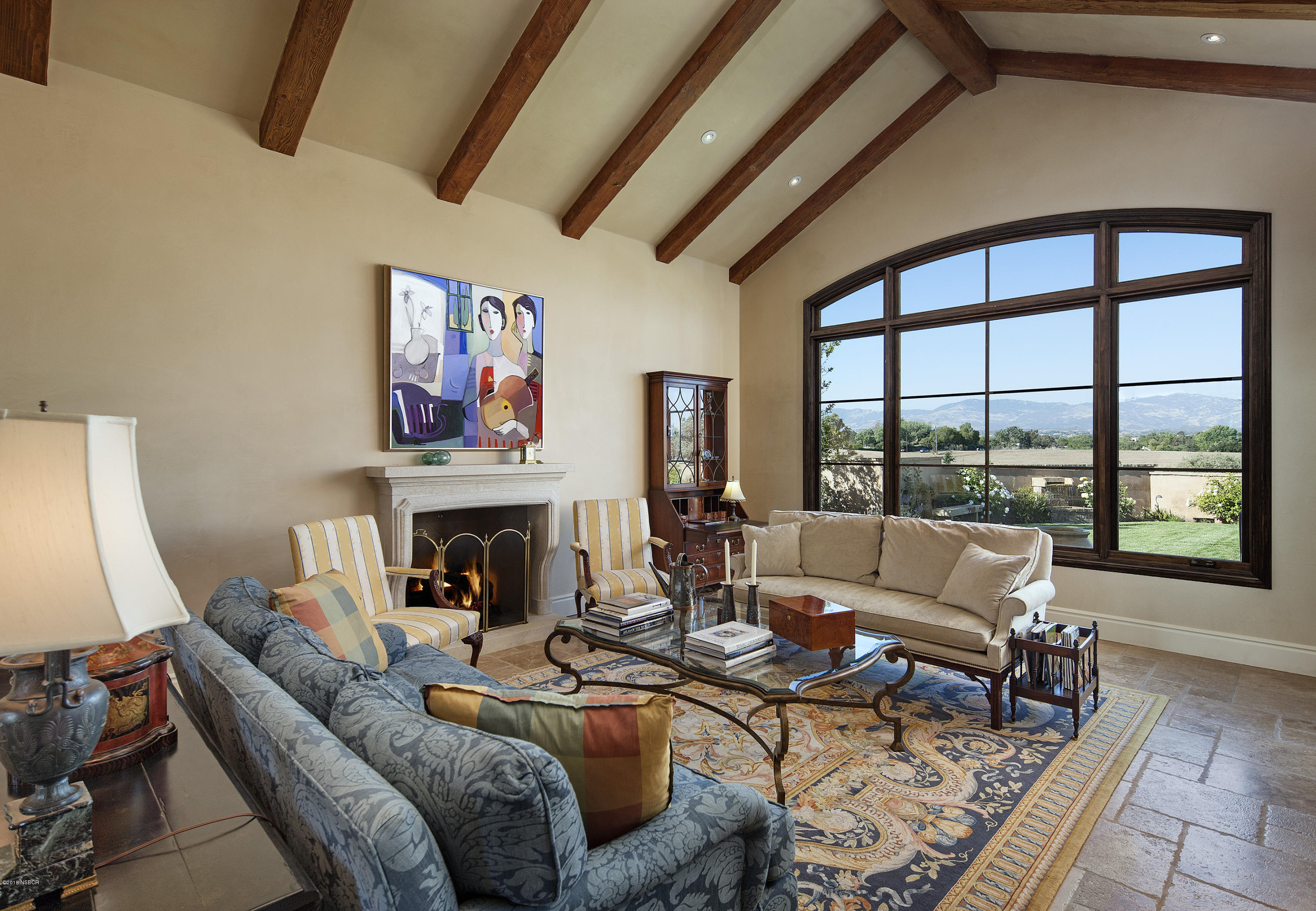 1775 Still Meadow Road Solvang, CA 93463 - Photo 4 of 28 a living room with furniture large window and fireplace