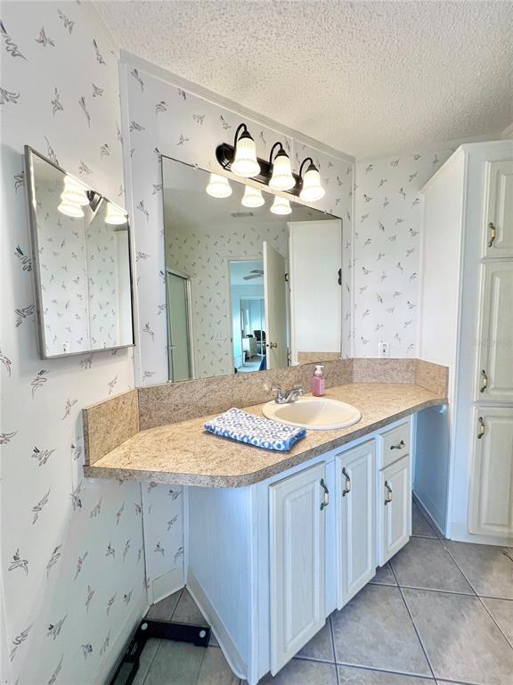 1100 South Belcher Road, Unit 391 Largo, FL 33771 - Photo 25 of 60 a bathroom with a sink and a mirror