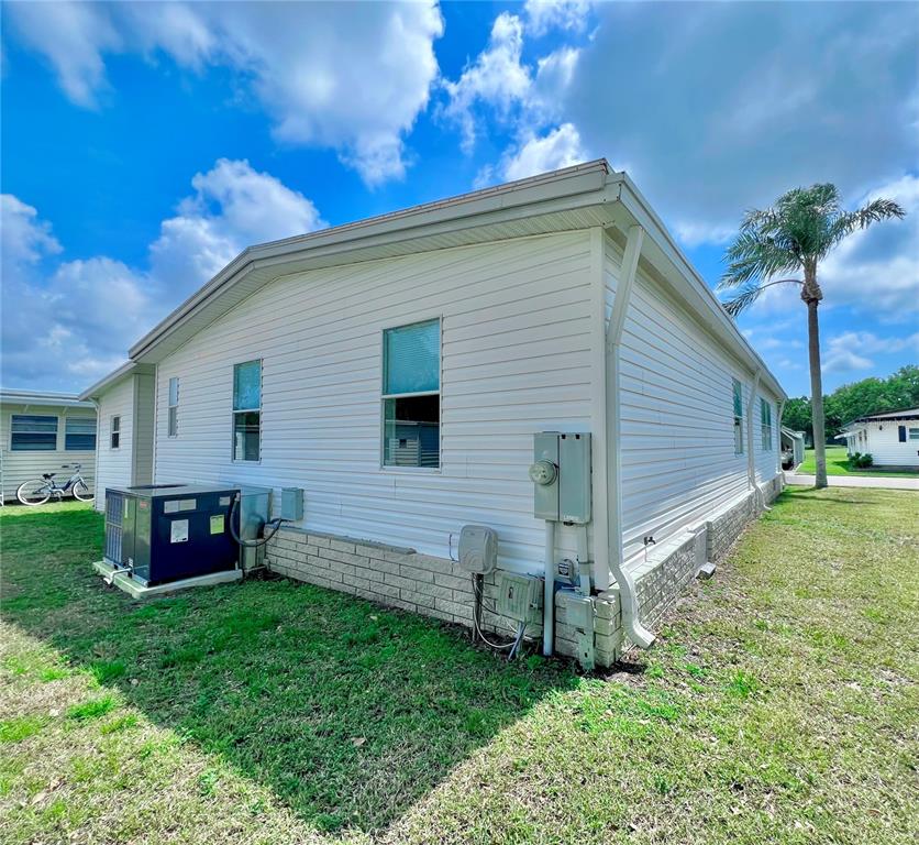 1100 South Belcher Road, Unit 391 Largo, FL 33771 - Photo 34 of 60 a view of backyard with a garden and entertaining space