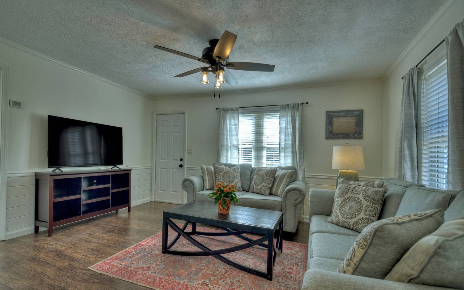 642 East 2nd Street Blue Ridge, GA 30513 - Photo 23 of 44 a living room with furniture and a flat screen tv