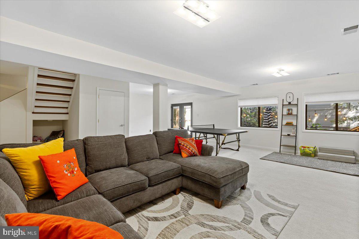 9411 Fernwood Road Bethesda, MD 20817 - Photo 19 of 28 a living room with furniture and wooden floor