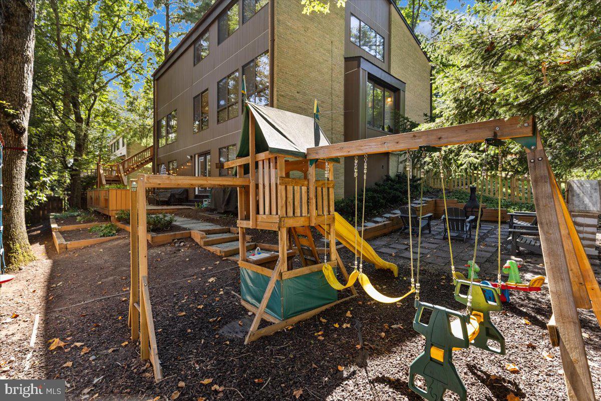 9411 Fernwood Road Bethesda, MD 20817 - Photo 24 of 28 a house view with a garden space