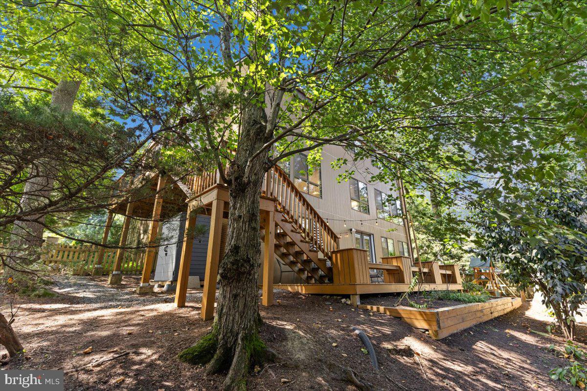9411 Fernwood Road Bethesda, MD 20817 - Photo 27 of 28 a view of a house with a tree