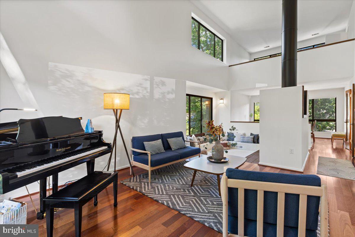 9411 Fernwood Road Bethesda, MD 20817 - Photo 9 of 28 a living room with furniture and wooden floor