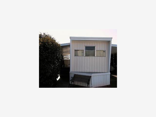a black and white photo of a house