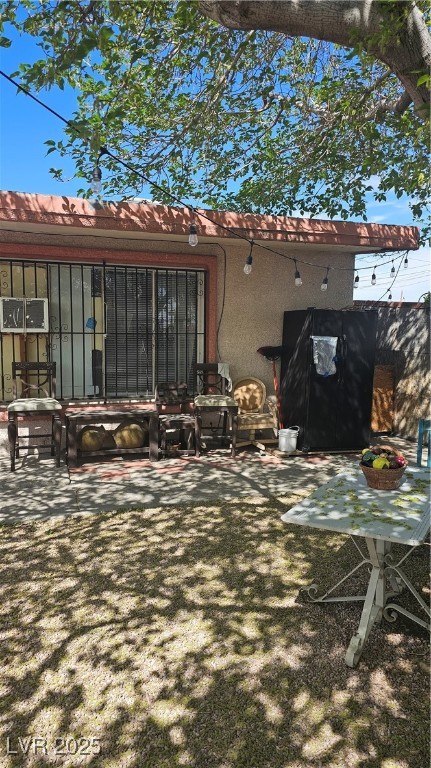 2120 Glider Street North Las Vegas, NV 89030 - Photo 12 of 50 Back of property featuring stucco siding