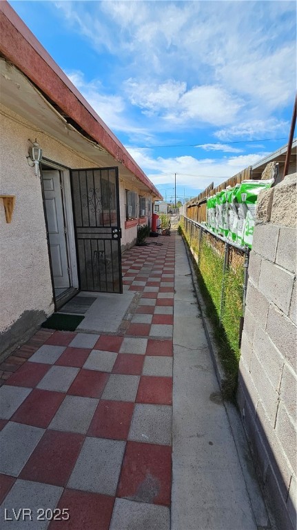 2120 Glider Street North Las Vegas, NV 89030 - Photo 32 of 50 View of patio / terrace featuring fence