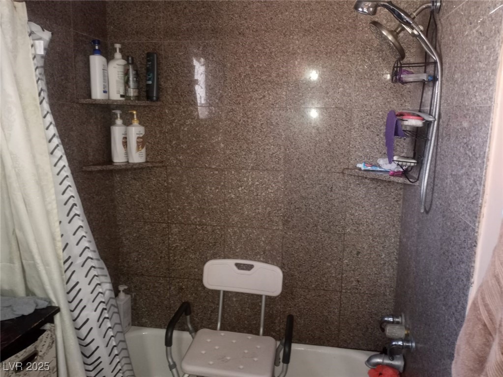 2120 Glider Street North Las Vegas, NV 89030 - Photo 47 of 50 Bathroom featuring shower / bath combo