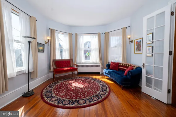 a very nice looking living room with a large window