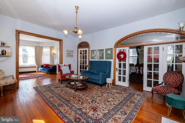 a kitchen with sink refrigerator and cabinets