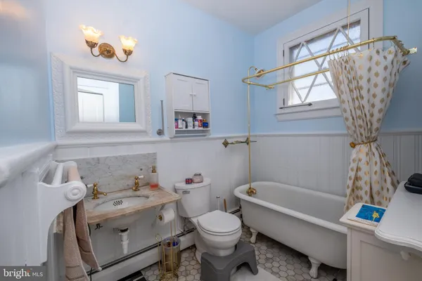 a room with furniture and a flat screen tv