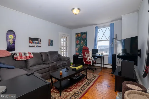 a bedroom with a bed and dresser