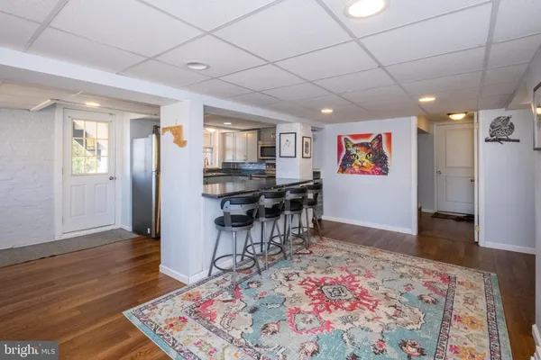 a utility room with sink dryer and washer