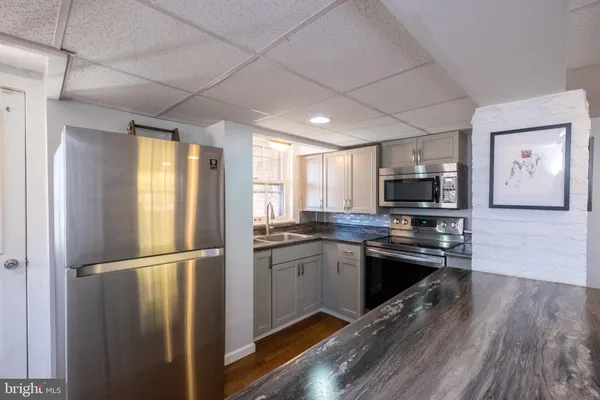 a house view with a backyard space