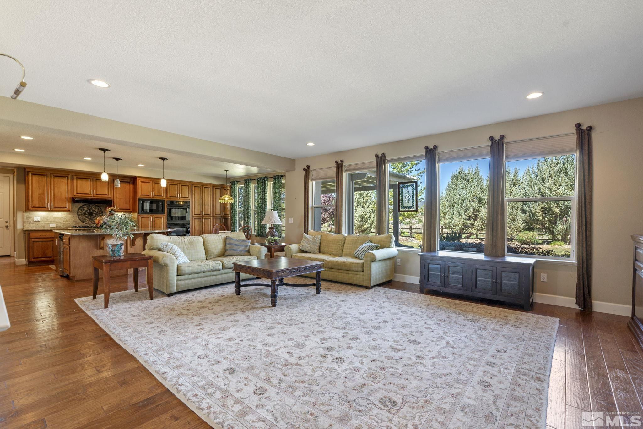 1955 Bechtol Ridge Circle Reno, NV 89523 - Photo 4 of 38 a living room with furniture and a large window