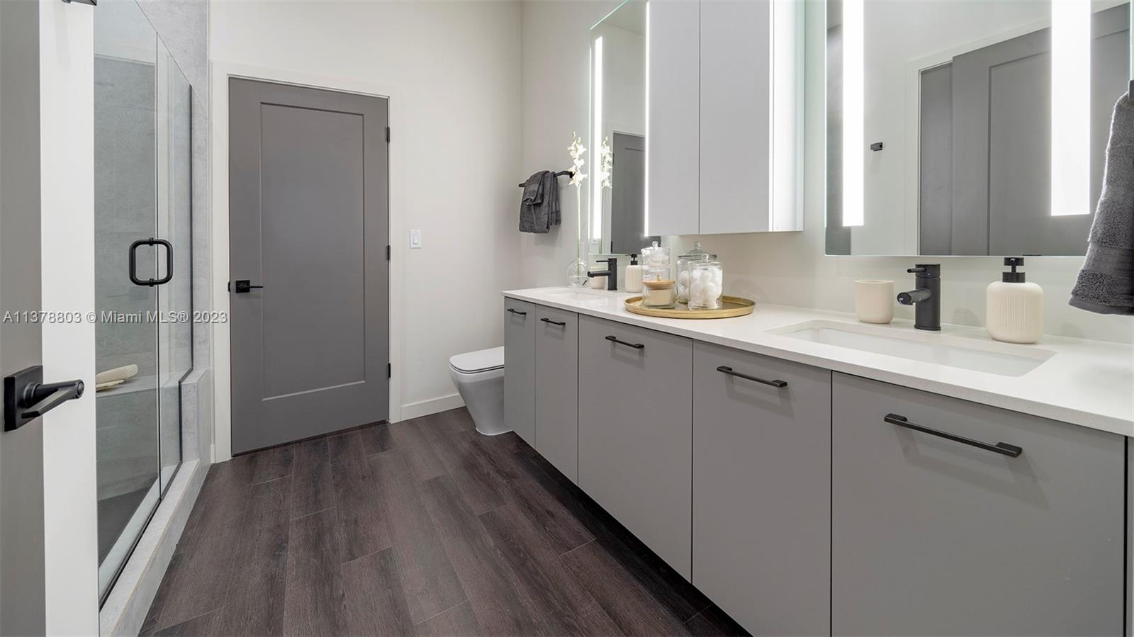 6970 Southwest 40th Street, Unit 442 Miami, FL 33155 - Photo 9 of 23 a bathroom with a sink and a mirror