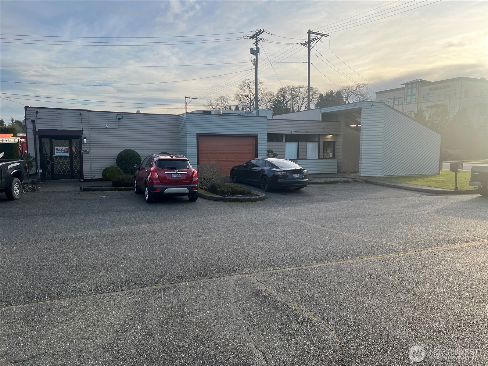 7521 Bridgeport Way West, Unit B Lakewood, WA 98499 - Photo 1 of 7 a view of car parking