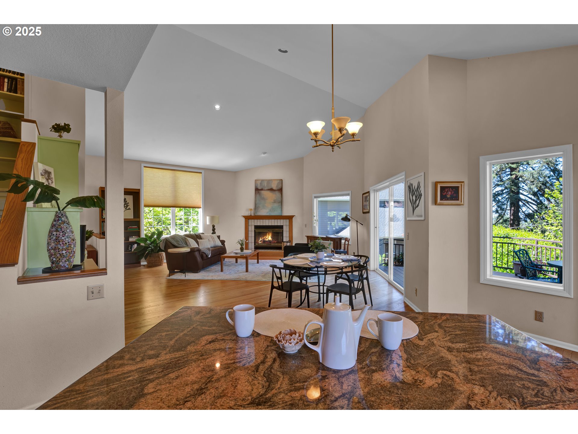 3348 Storey Boulevard Eugene, OR 97405 - Photo 20 of 47 a living room with furniture a dining table and a window