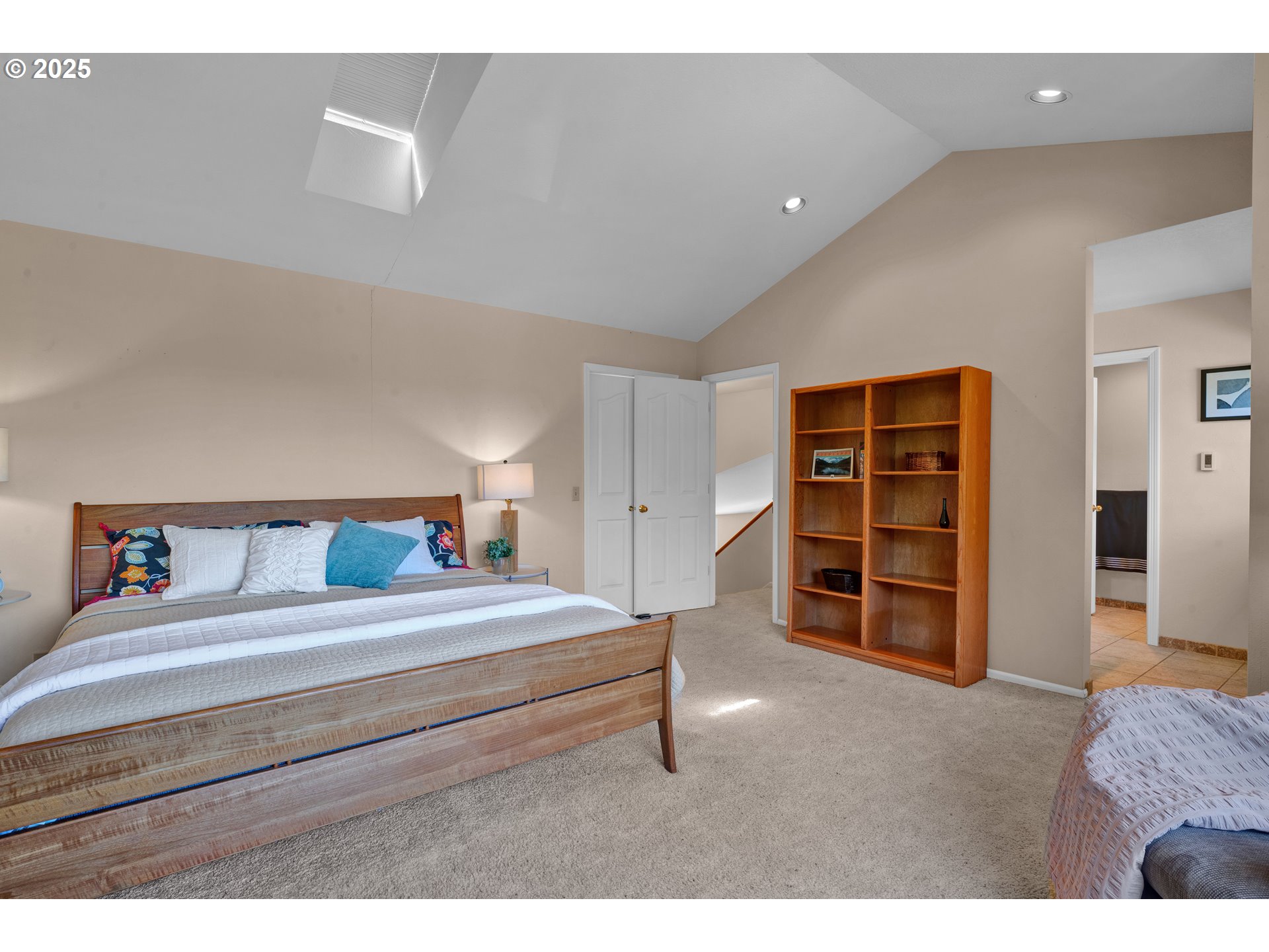 3348 Storey Boulevard Eugene, OR 97405 - Photo 27 of 47 a bedroom with a bed and a television