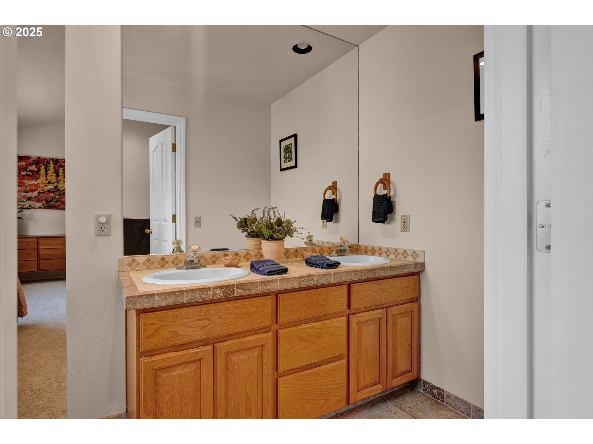3348 Storey Boulevard Eugene, OR 97405 - Photo 29 of 47 a bathroom with a sink and a mirror