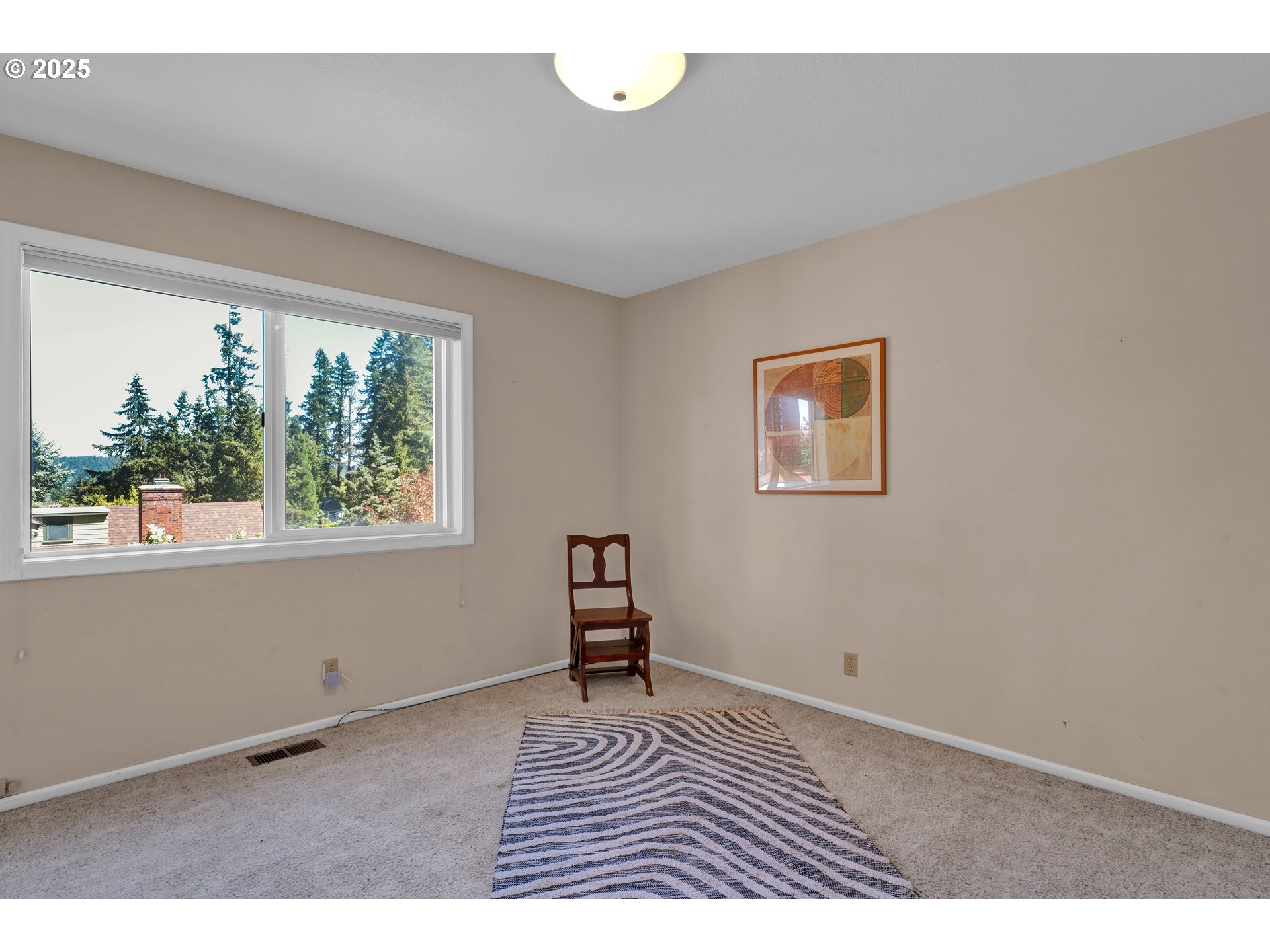 3348 Storey Boulevard Eugene, OR 97405 - Photo 36 of 47 a view of an empty room with a window