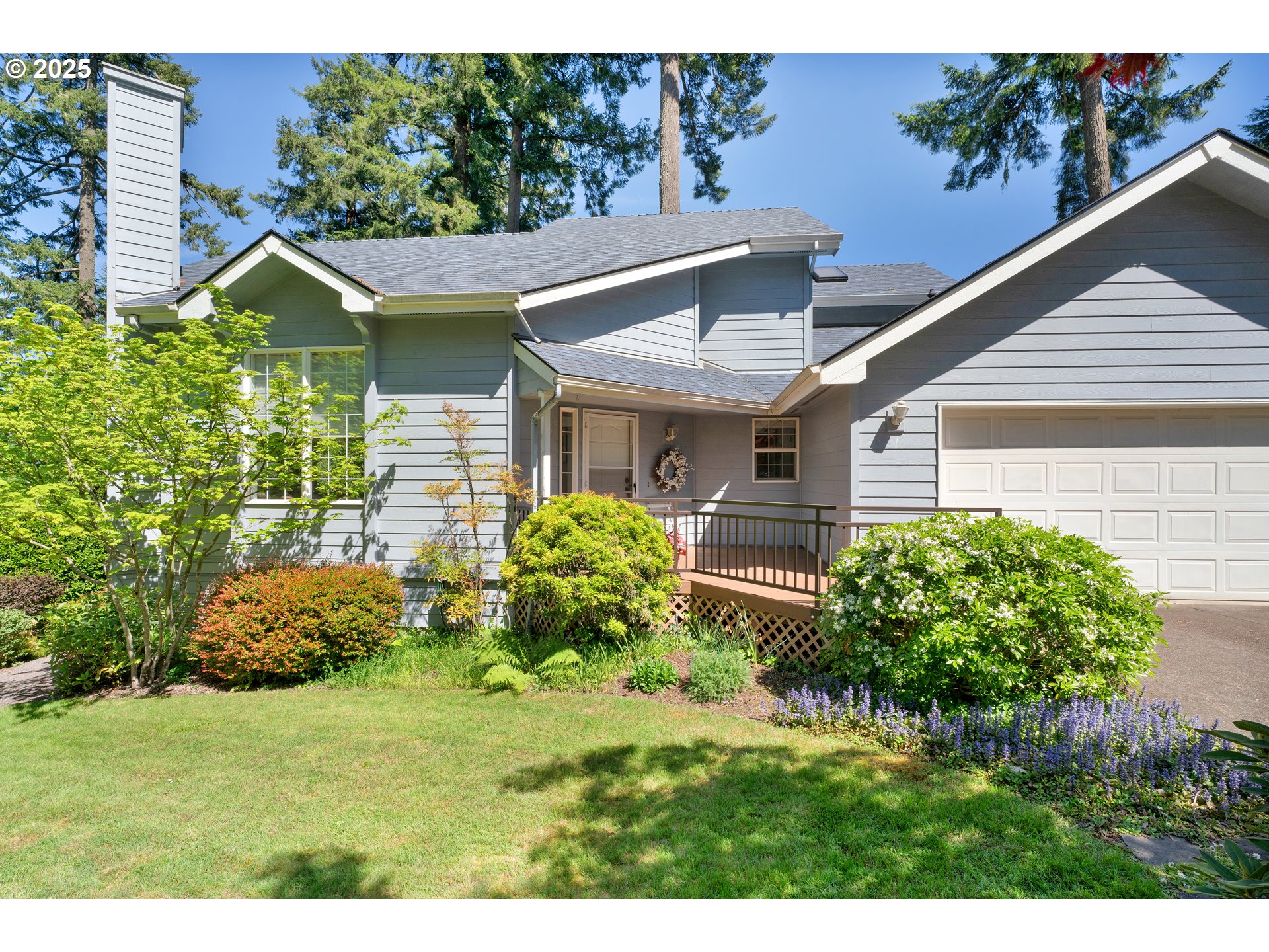 3348 Storey Boulevard Eugene, OR 97405 - Photo 8 of 47 a front view of a house with garden