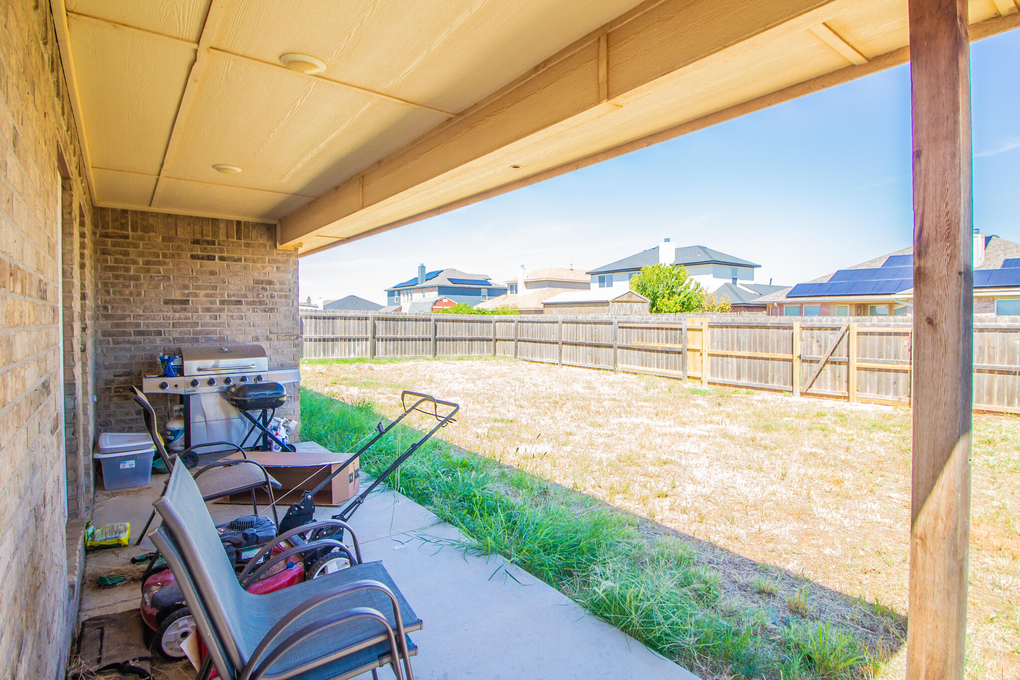 8808 14th Street Lubbock, TX 79416 - Photo 17 of 19 a view of a balcony with chairs and a table