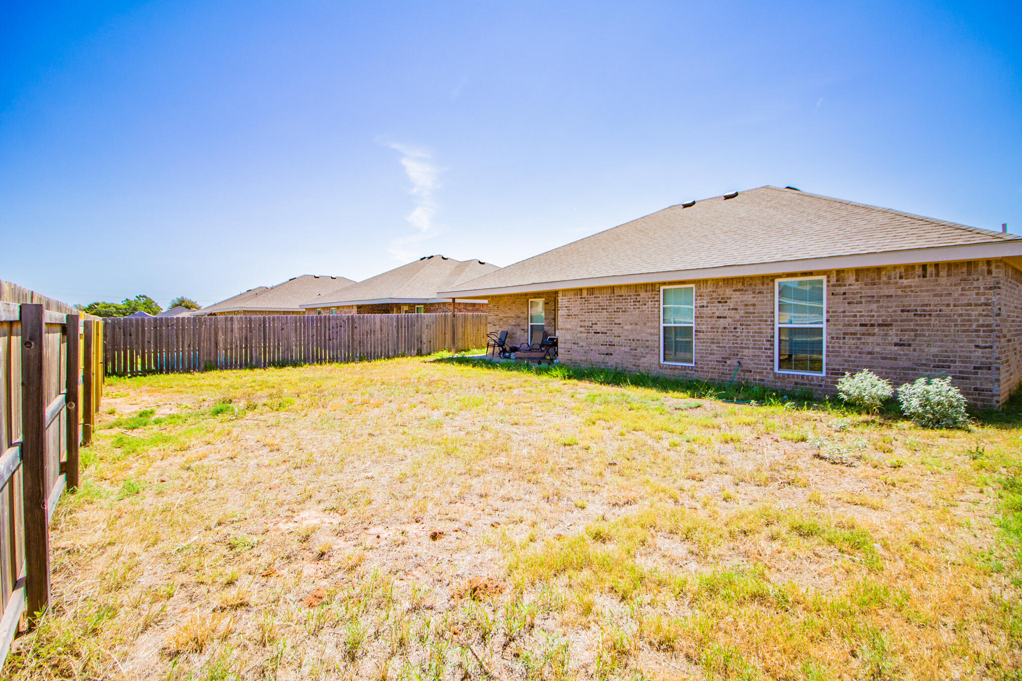 8808 14th Street Lubbock, TX 79416 - Photo 19 of 19 a view of a house with a swimming pool