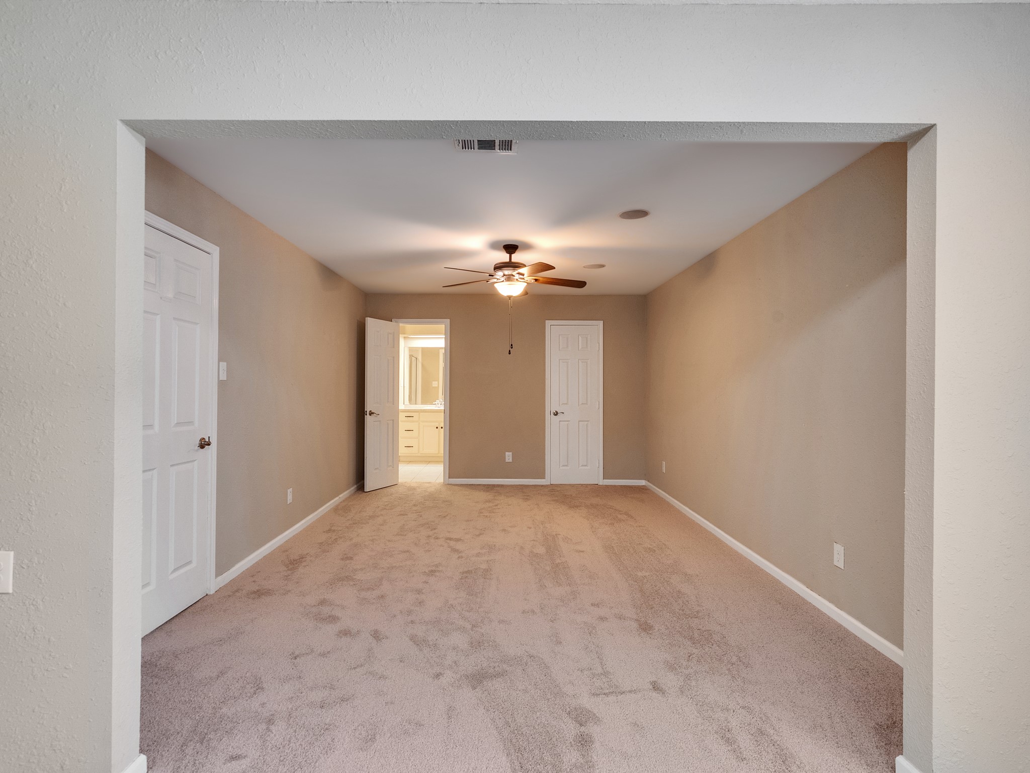 603 Casper Court Spring, TX 77373 - Photo 10 of 31 primary #1 view from sitting room to bathroom and closet