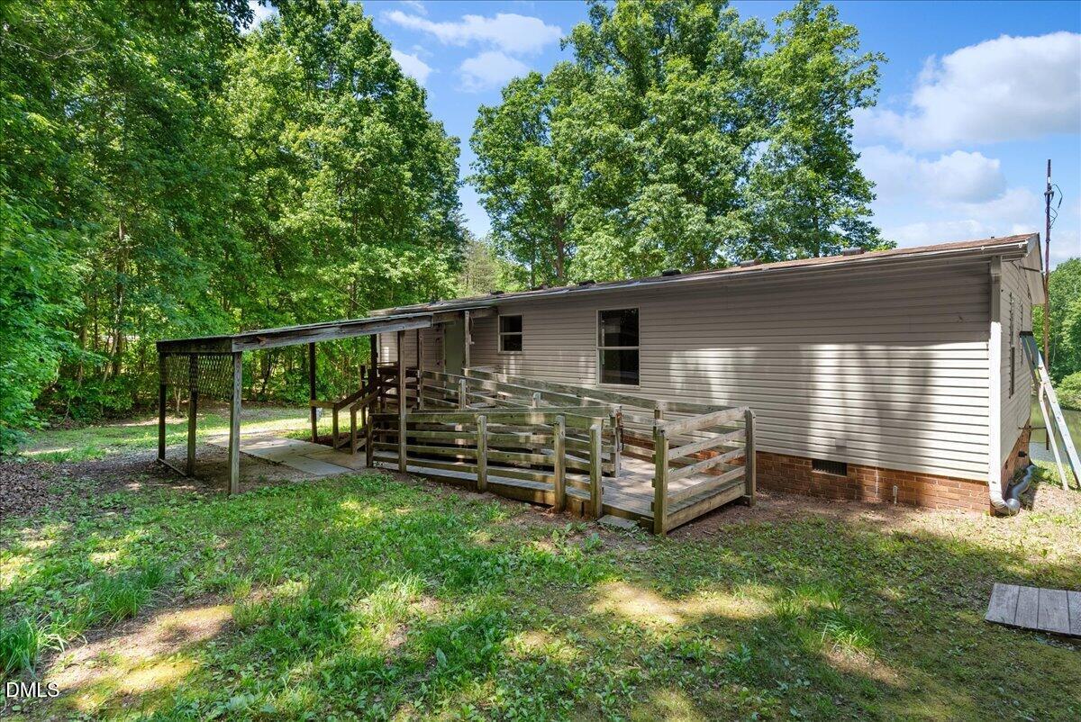 1111 Stoney Mountain Road Rougemont, NC 27572 - Photo 24 of 30 a front view of a house with a yard