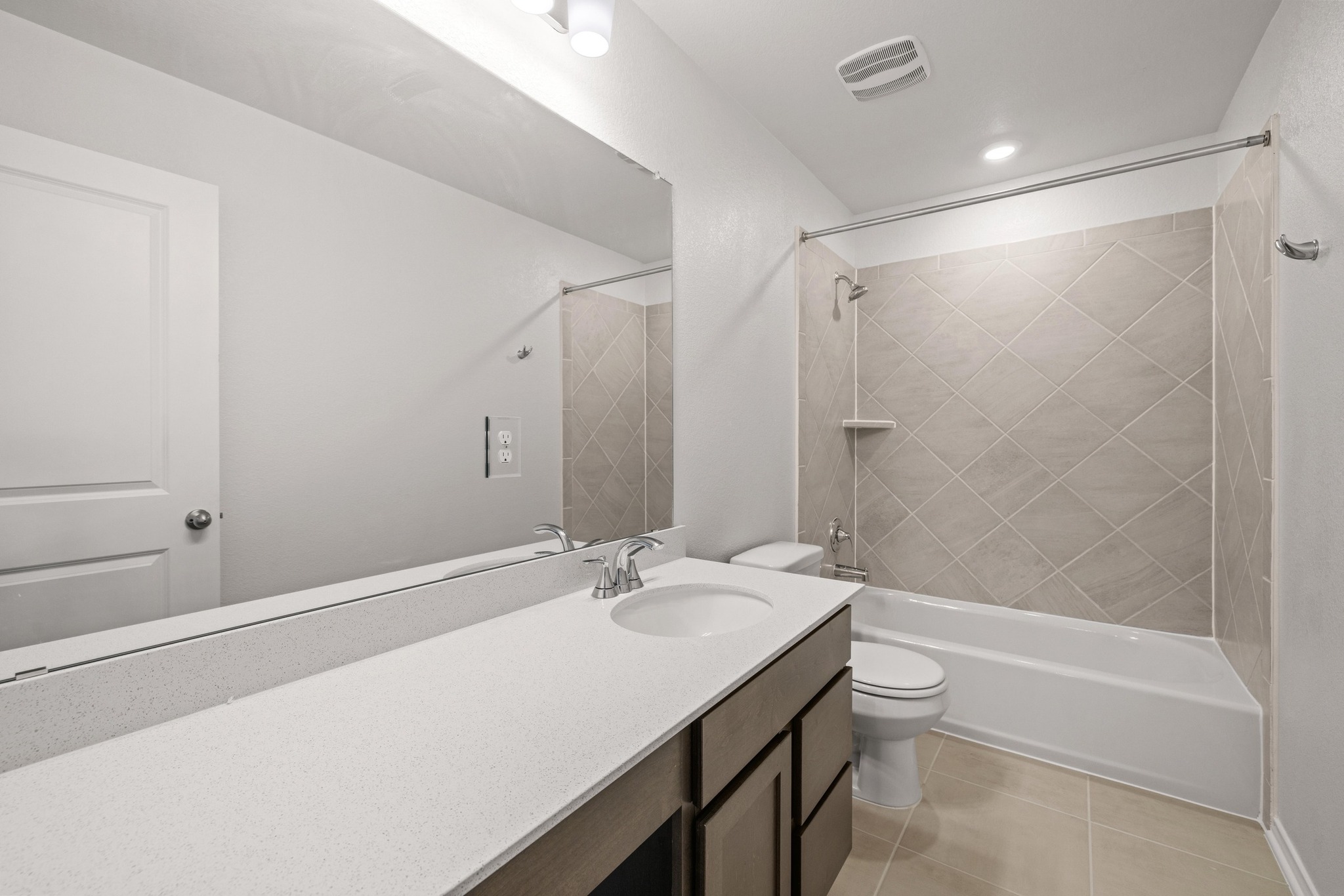 260 Feathers Street Jarrell, TX 76537 - Photo 25 of 34 a bathroom with a bathtub and a sink