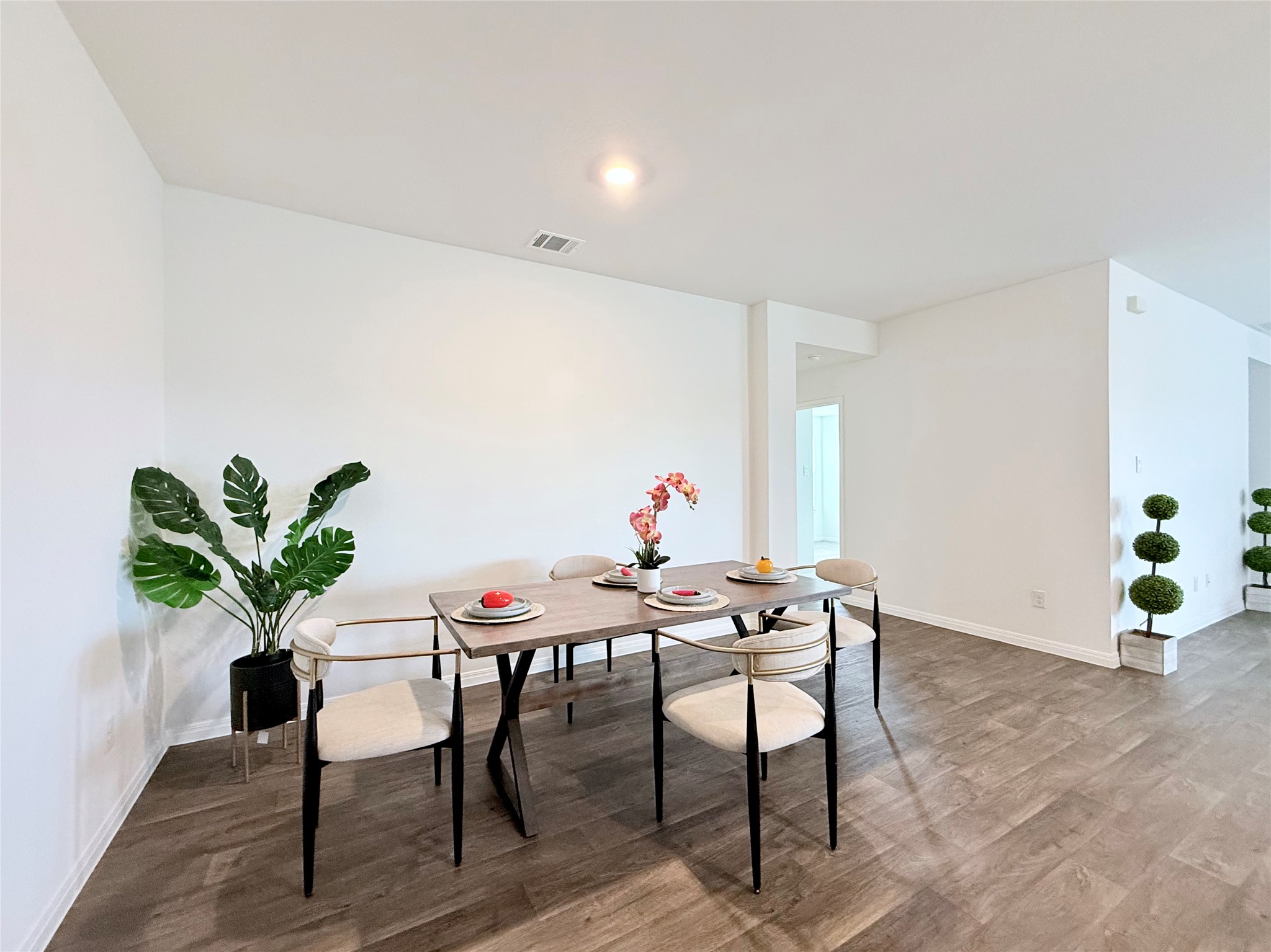 598 Gladiola Loop Kyle, TX 78640 - Photo 8 of 33 Dining space featuring wood finished floors and baseboards