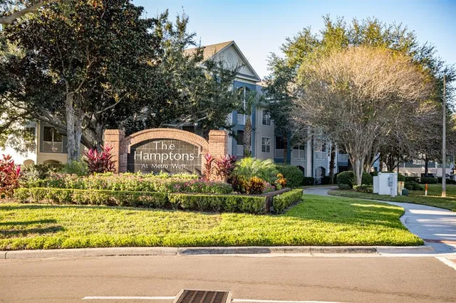 a view of a swimming pool with lounge chair