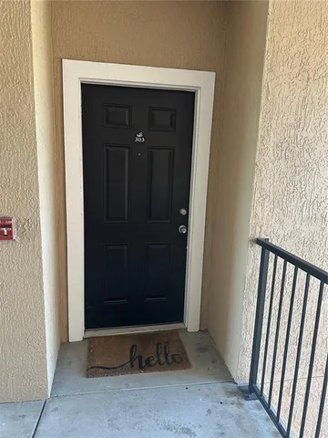 a kitchen with stainless steel appliances a refrigerator and a sink