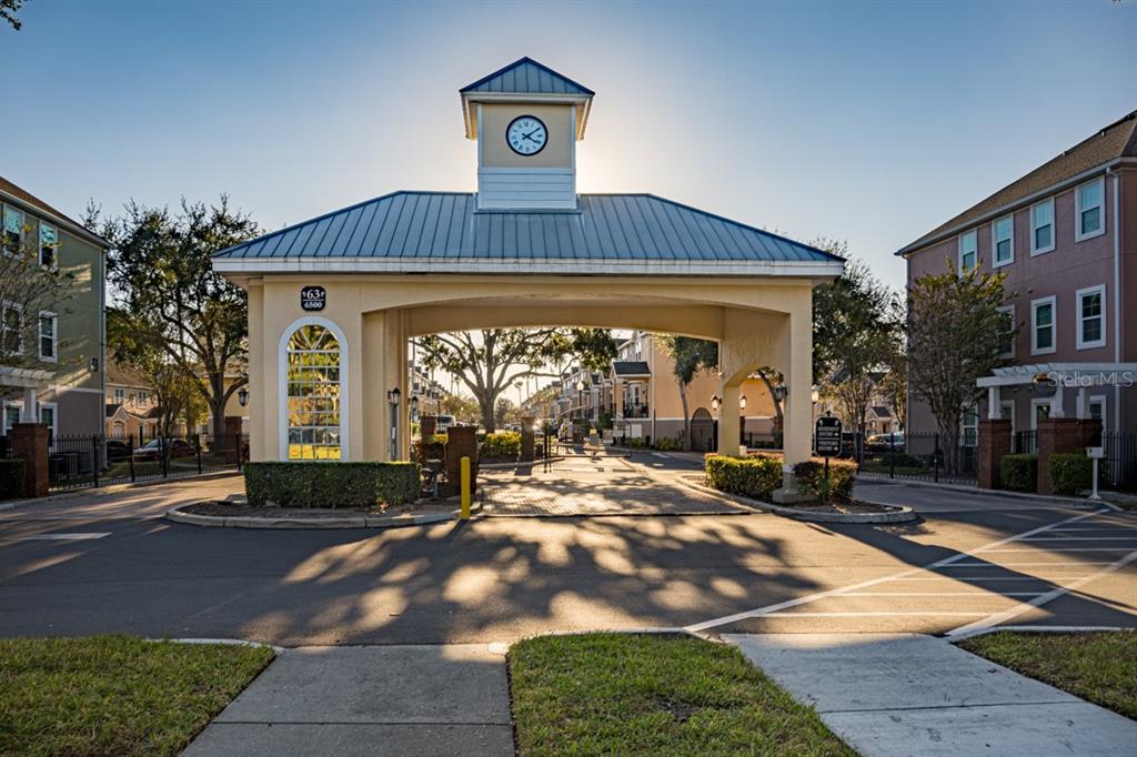 3468 Soho Street, Unit 303 Orlando, FL 32835 - Photo 21 of 21 a front view of a house with garden