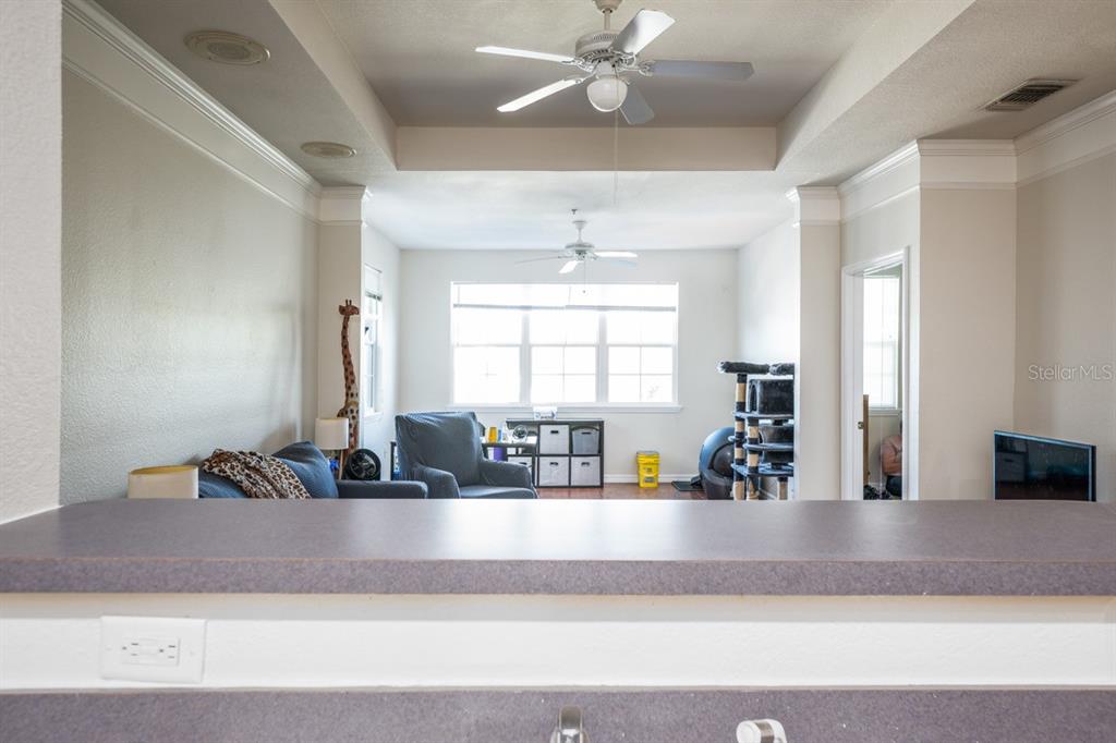 3468 Soho Street, Unit 303 Orlando, FL 32835 - Photo 8 of 21 a view of living room with a couch