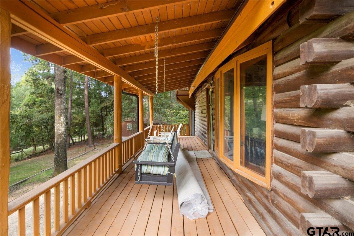 220 Dale Drive Avinger, TX 75630 - Photo 23 of 32 a view of balcony with wooden floor