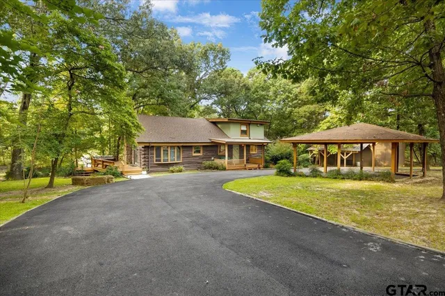 a view of house with outdoor space