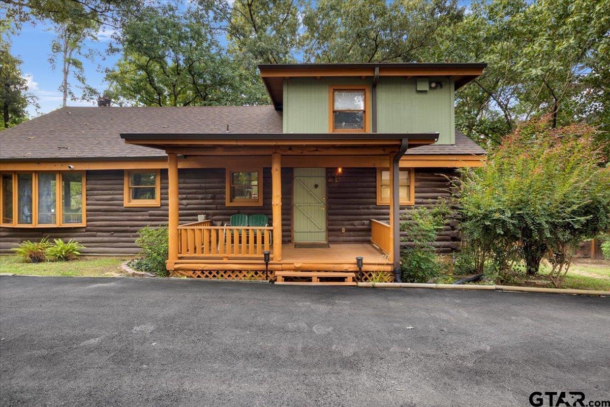 220 Dale Drive Avinger, TX 75630 - Photo 25 of 32 a view of house with outdoor space