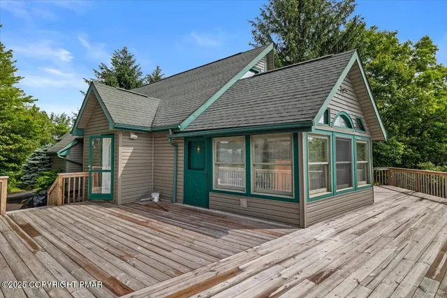 a front view of a house with a porch