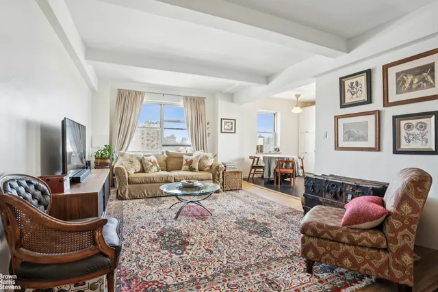a living room with furniture or couch and a flat screen tv