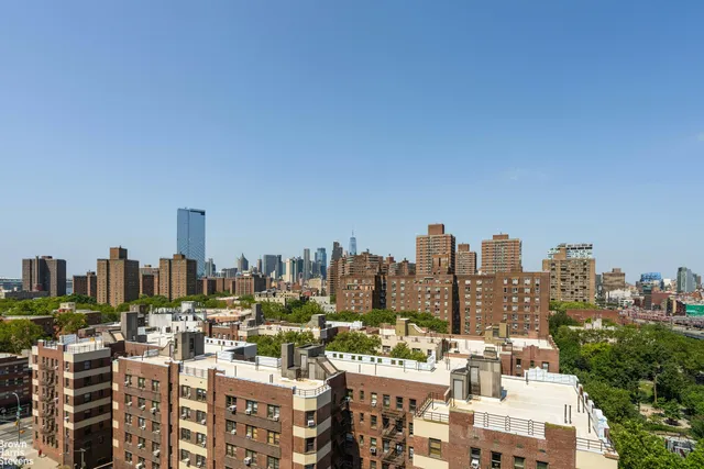 a view of a city with tall buildings