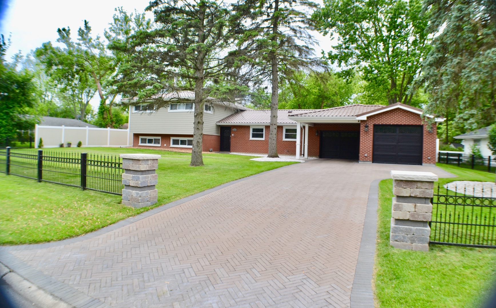 2014 Driving Park Road Wheaton, IL 60187 - Photo 2 of 32 a front view of house with yard and green space